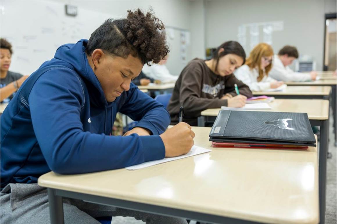 Student working in Education Center.